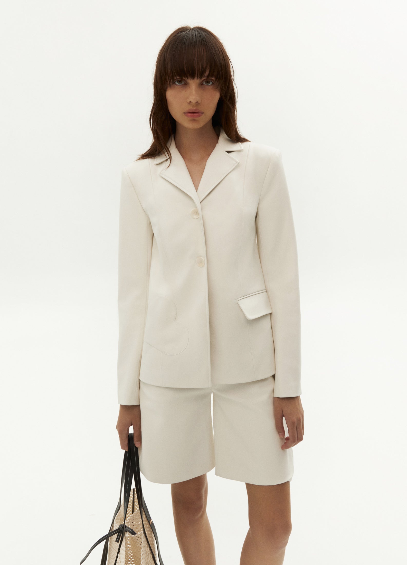 Women's white faux leather jacket. Jacket with heart detail. FORMA shop online