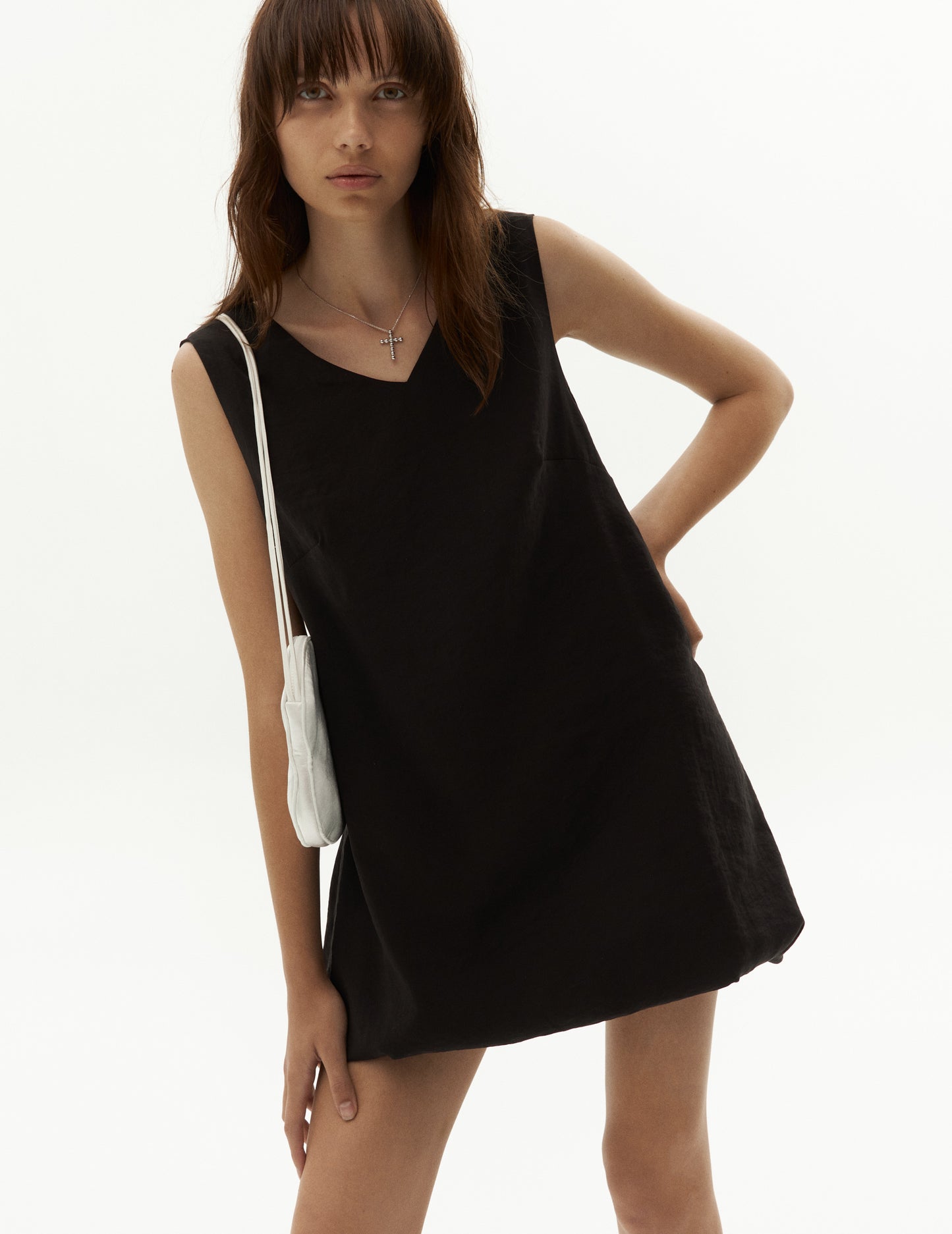 Heart shoulders bag and black ballon day dress. Summer collection from FORMA fashion brand