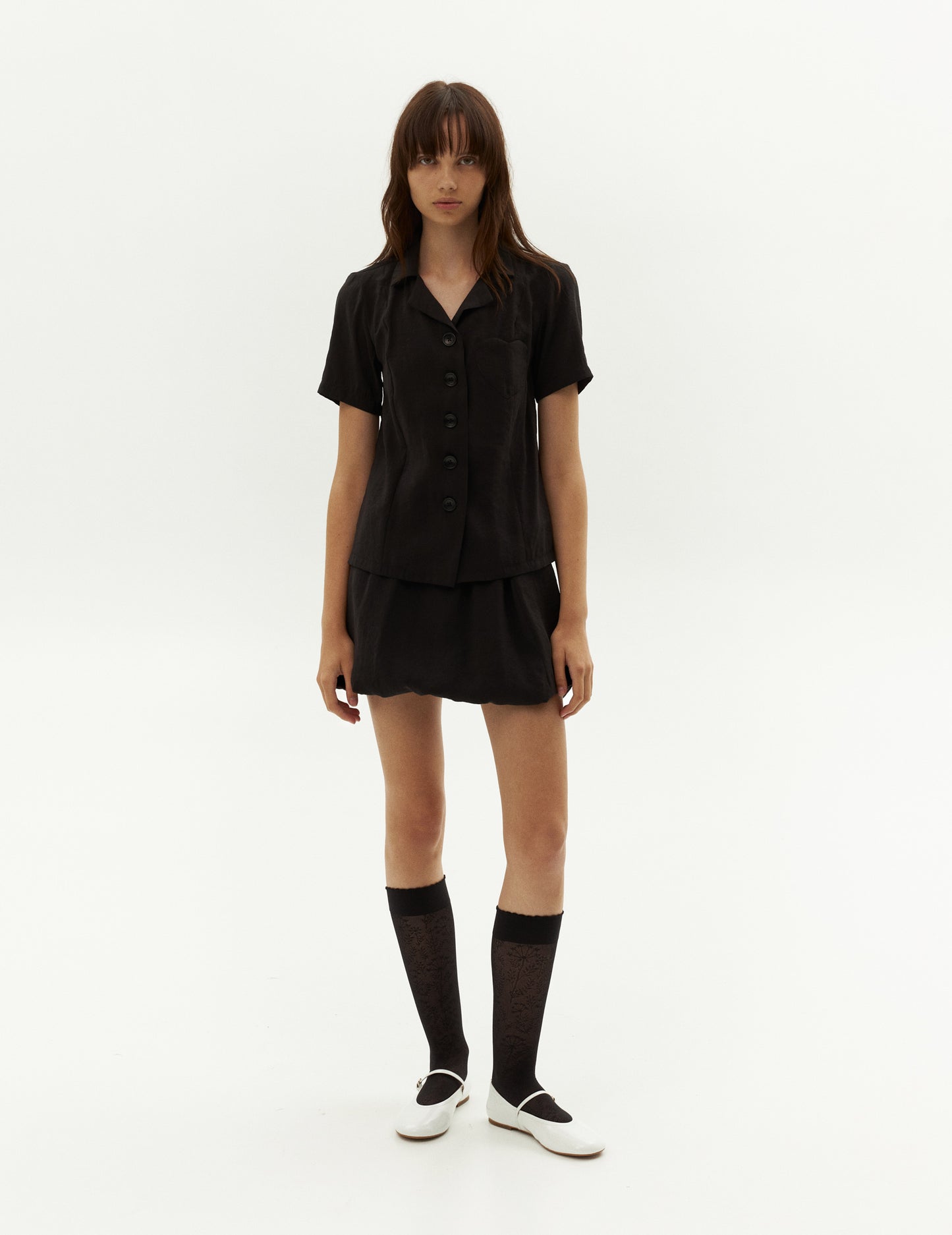 With a flattering side slit and a front button fastening, this shirt is perfect for any occasion. Match this with our viscose black balloon skirt and wear it like a suit for a stylish and coordinated look. Don't miss out on this must-have addition to your collection. Shop forma brand online, worldwide shipping