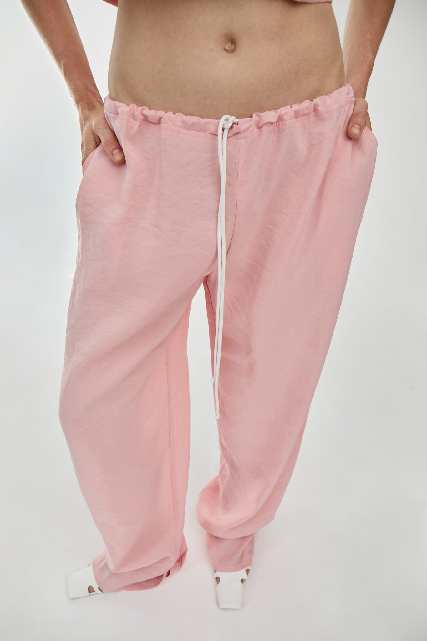 Viscose blend trousers featuring a drawstring fastening waist, side pockets and a long length from FORMA brand