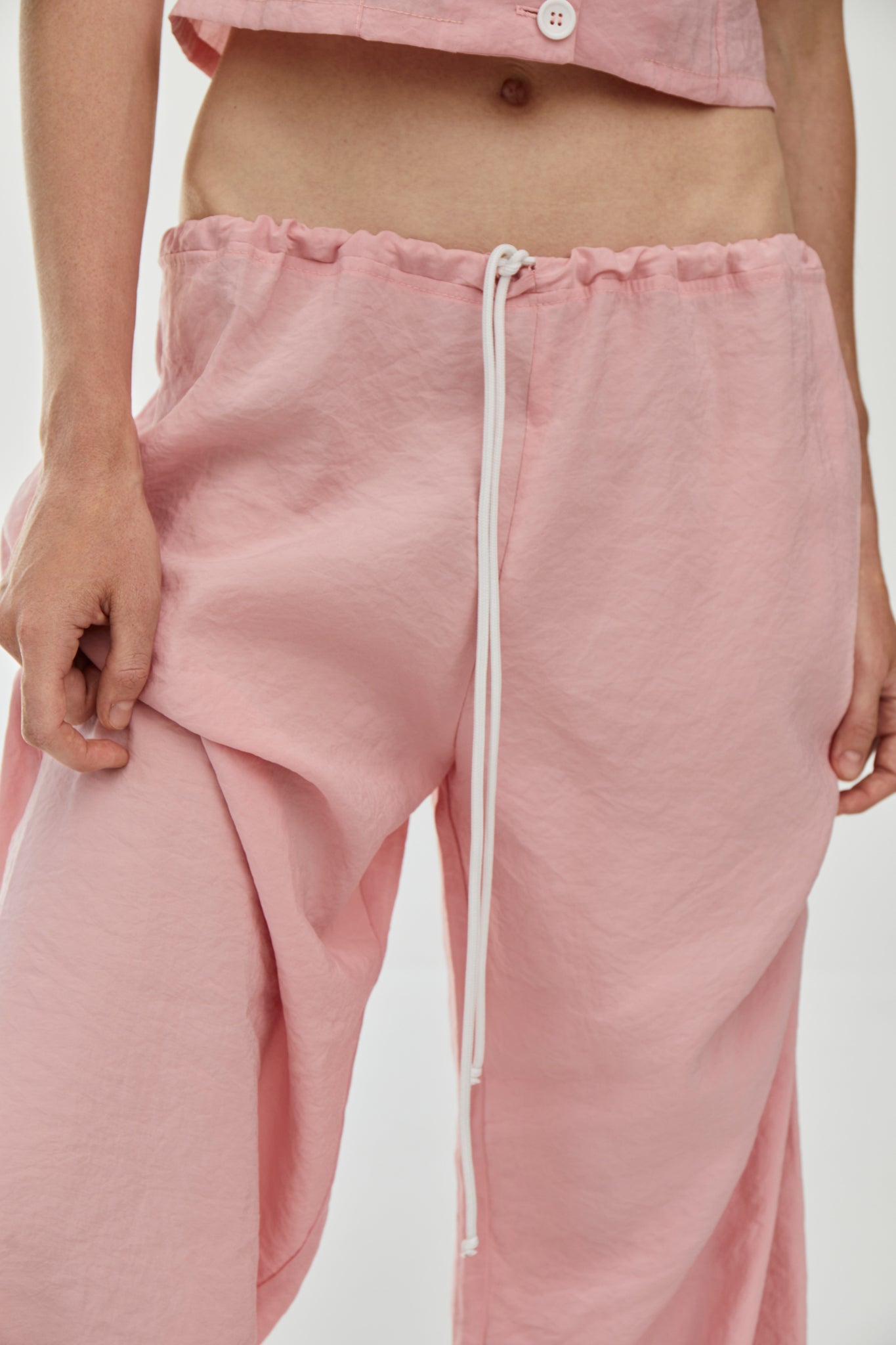Viscose blend trousers featuring a drawstring fastening waist, side pockets and a long length from FORMA brand