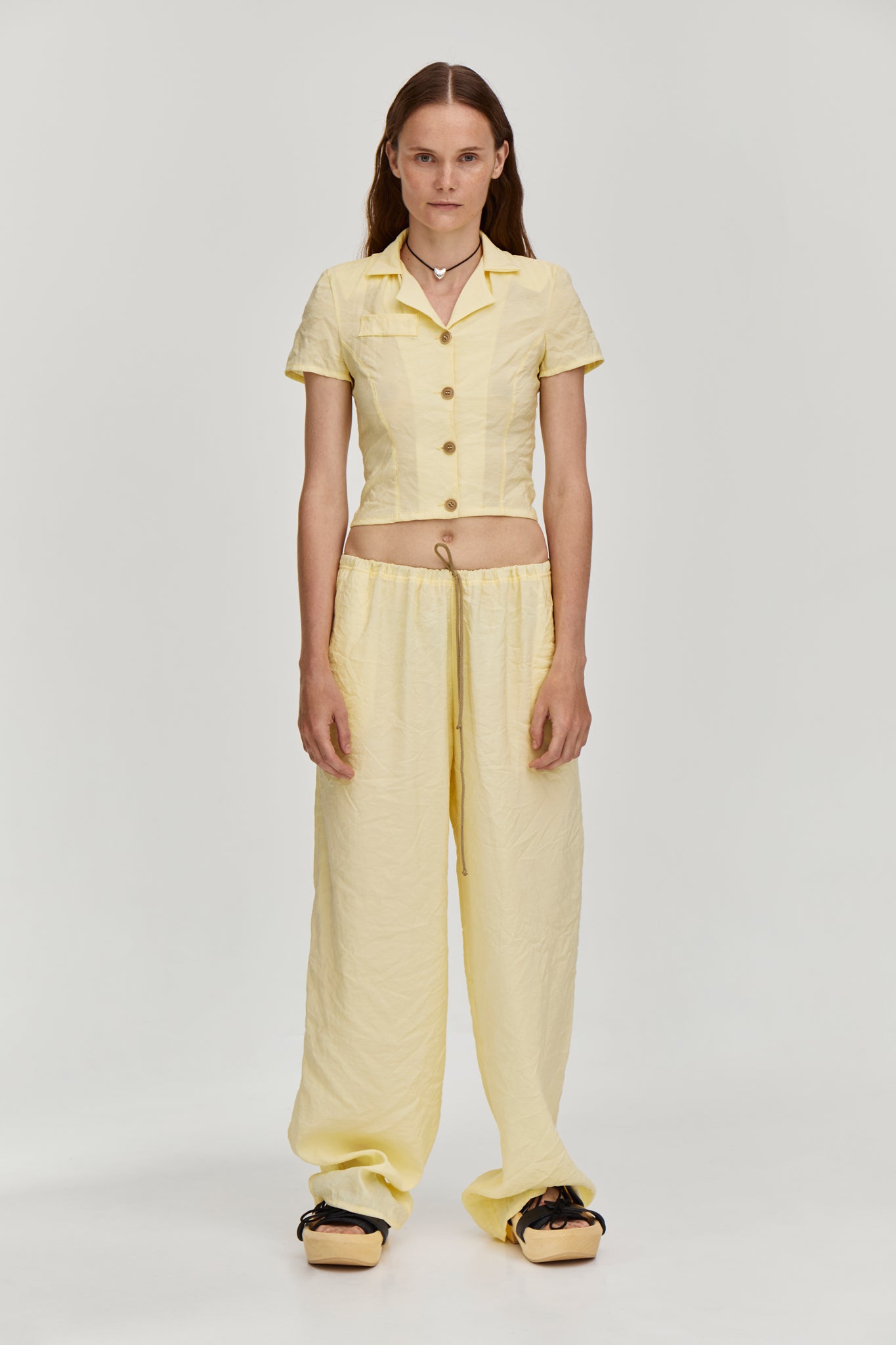 Viscose blend trousers featuring a drawstring fastening waist, side pockets and a long length from FORMA brand