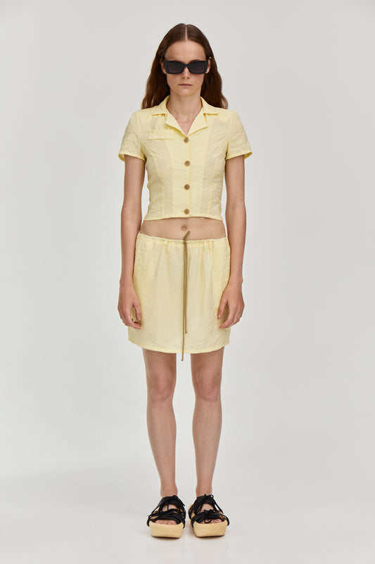 Viscose blend skirt featuring a drawstring fastening waist, side pockets and a short length from FORMA brand