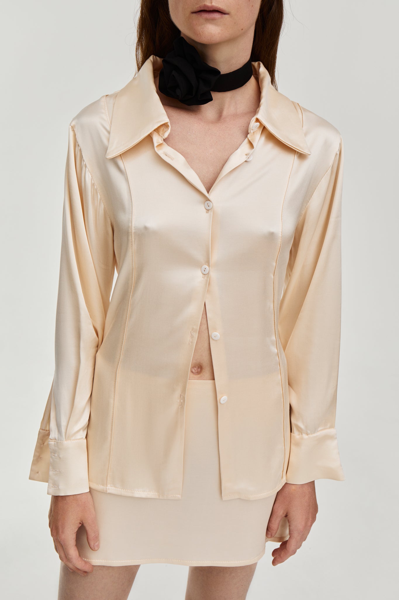 low waist mini silky skirt in creme color from FORMA clothing brand