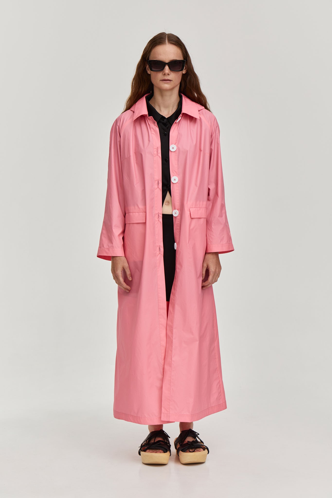 Summer raincoat with removable hood. Made from pink waterproof and breathable fabric. FORMA clothing