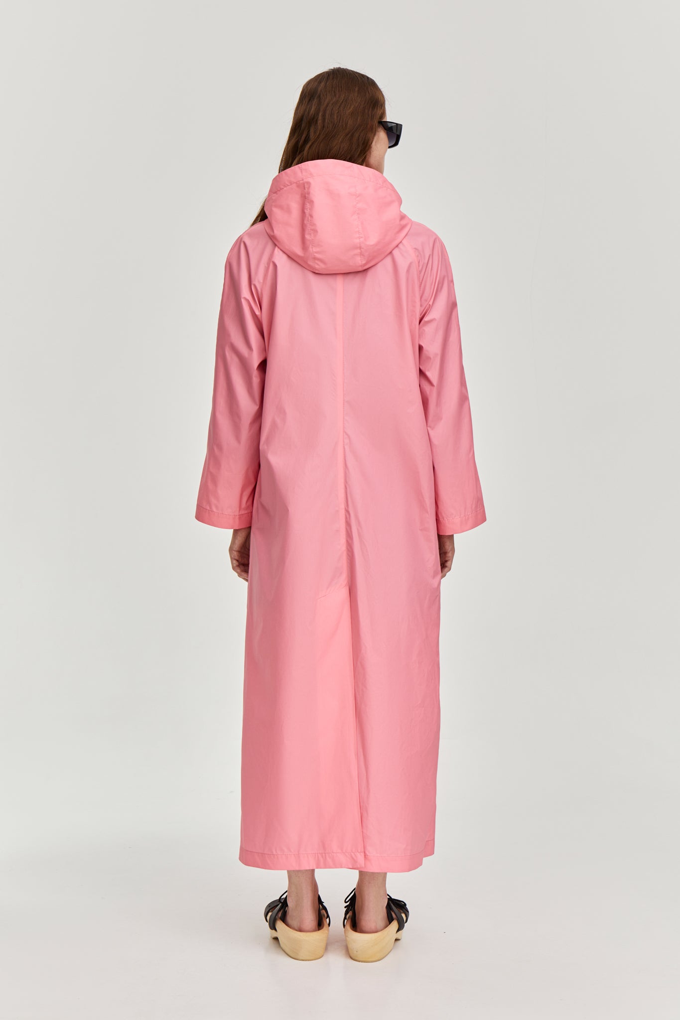 Summer raincoat with removable hood. Made from pink waterproof and breathable fabric. FORMA clothing