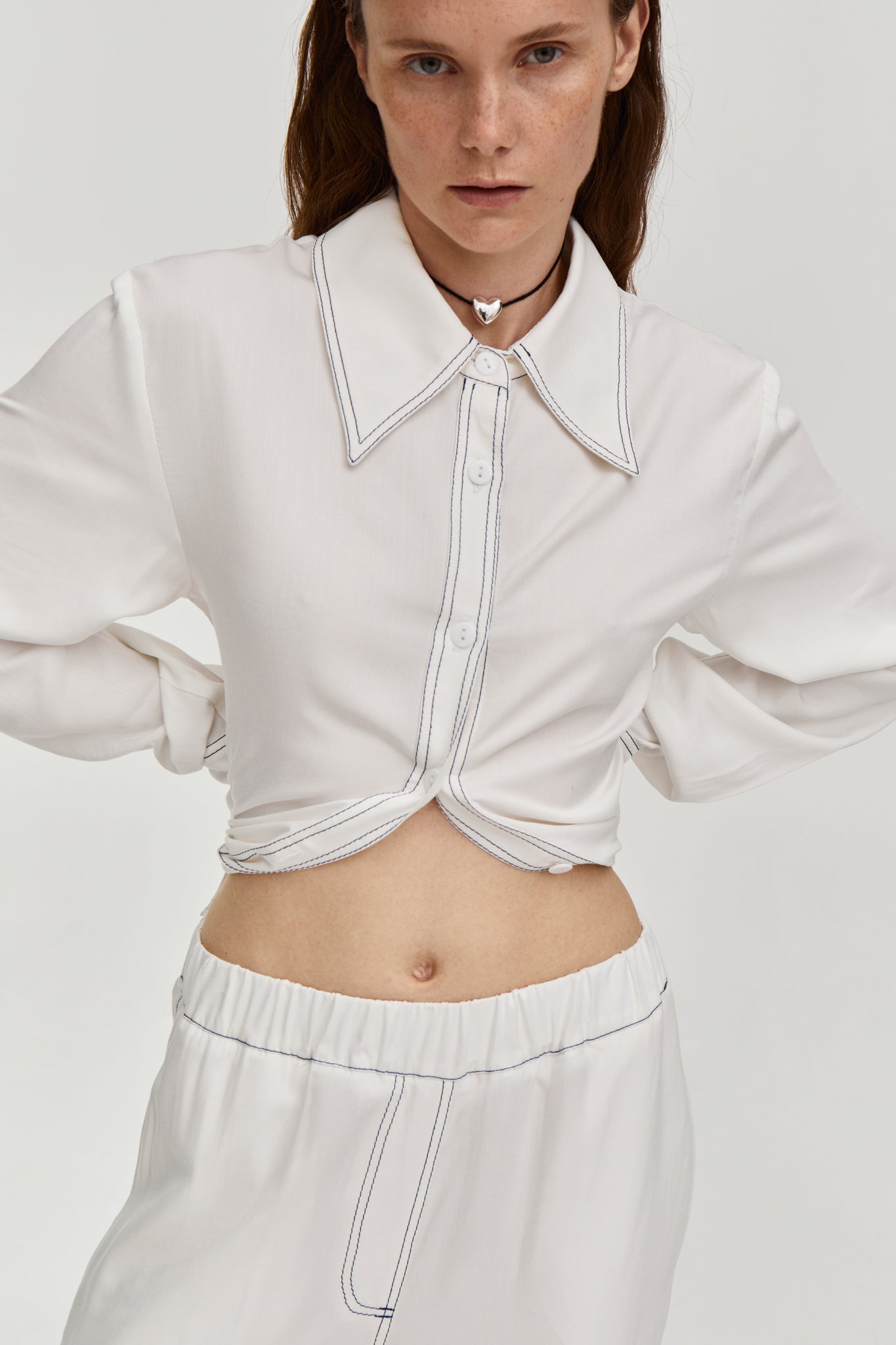 Shirt with a contrast stitching - White. FORMA clothing brand