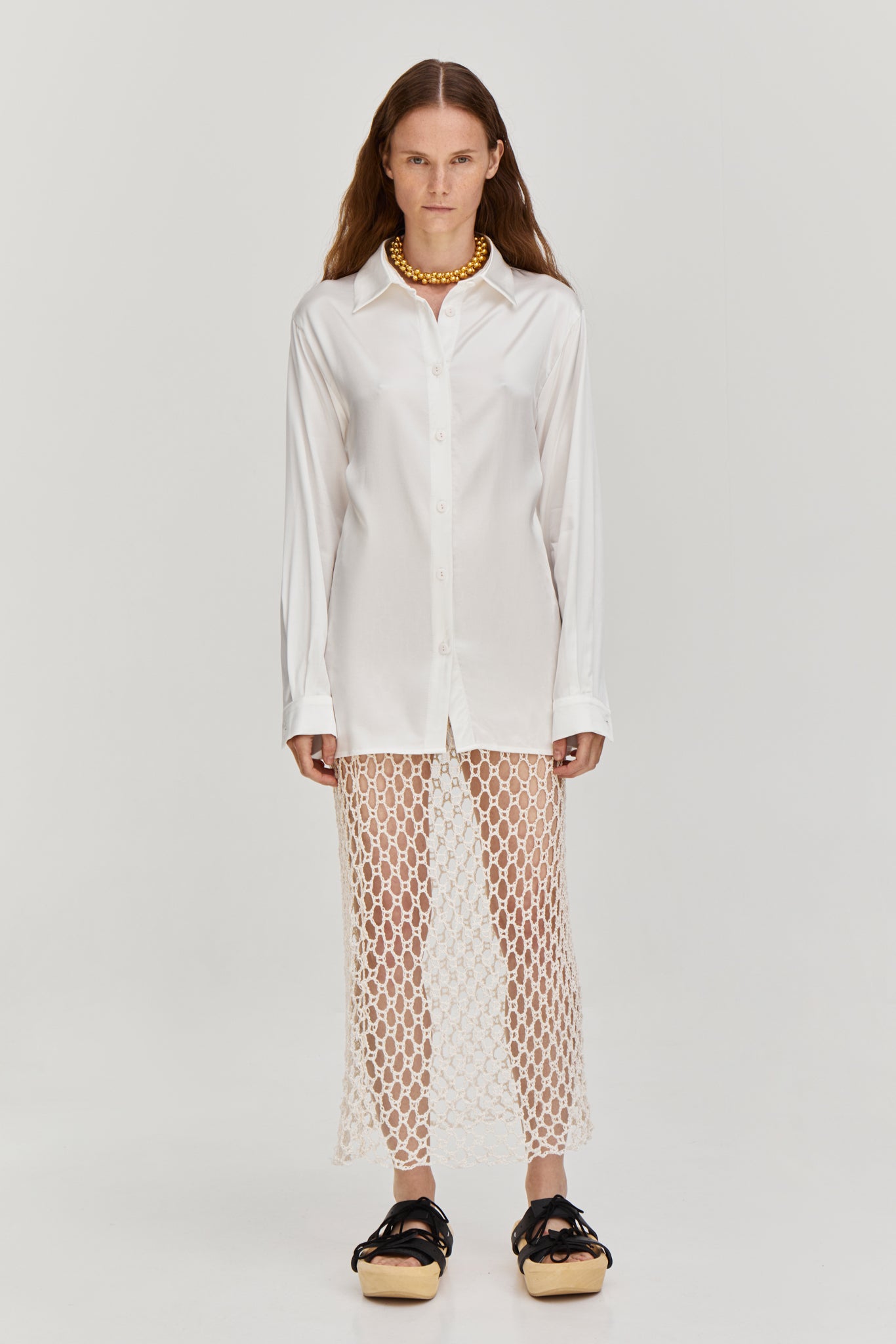 Crochet midi skirt in milky color from clothing brand FORMA