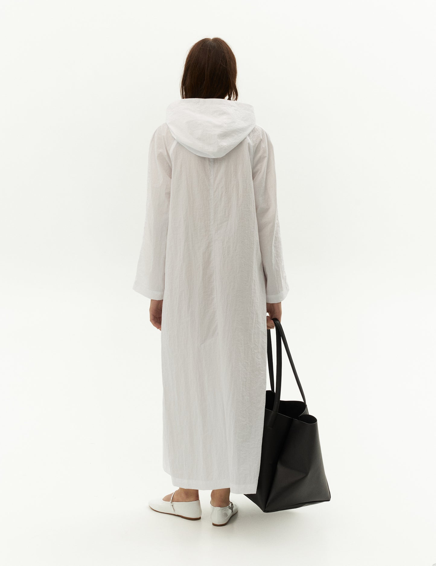 Textured white long raincoat with hood. White raincoat. Waterproof raincoat from forma clothing brand.