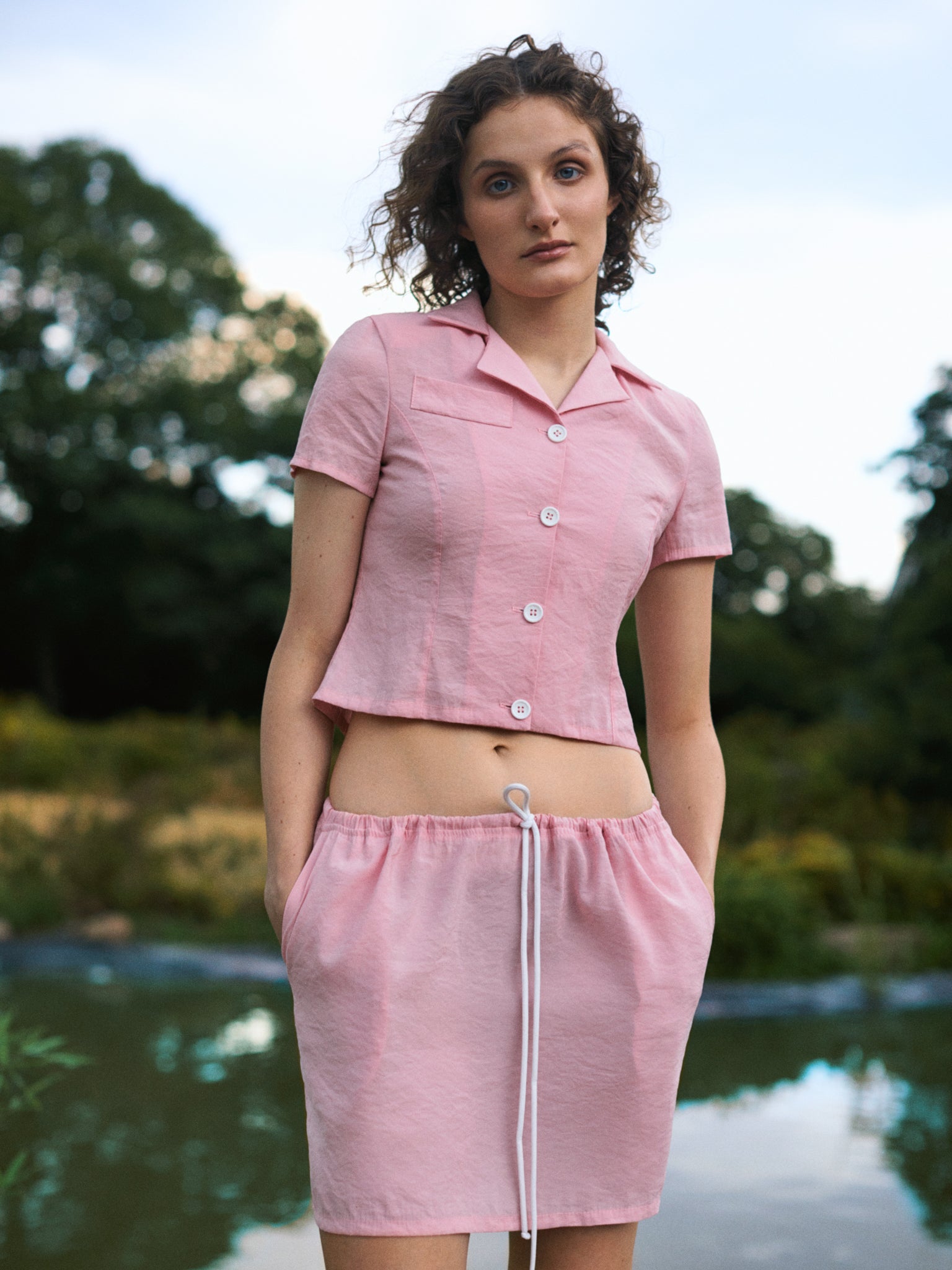 Viscose blend suit mini low waist skirt and crop jacket in pink color from FORMA