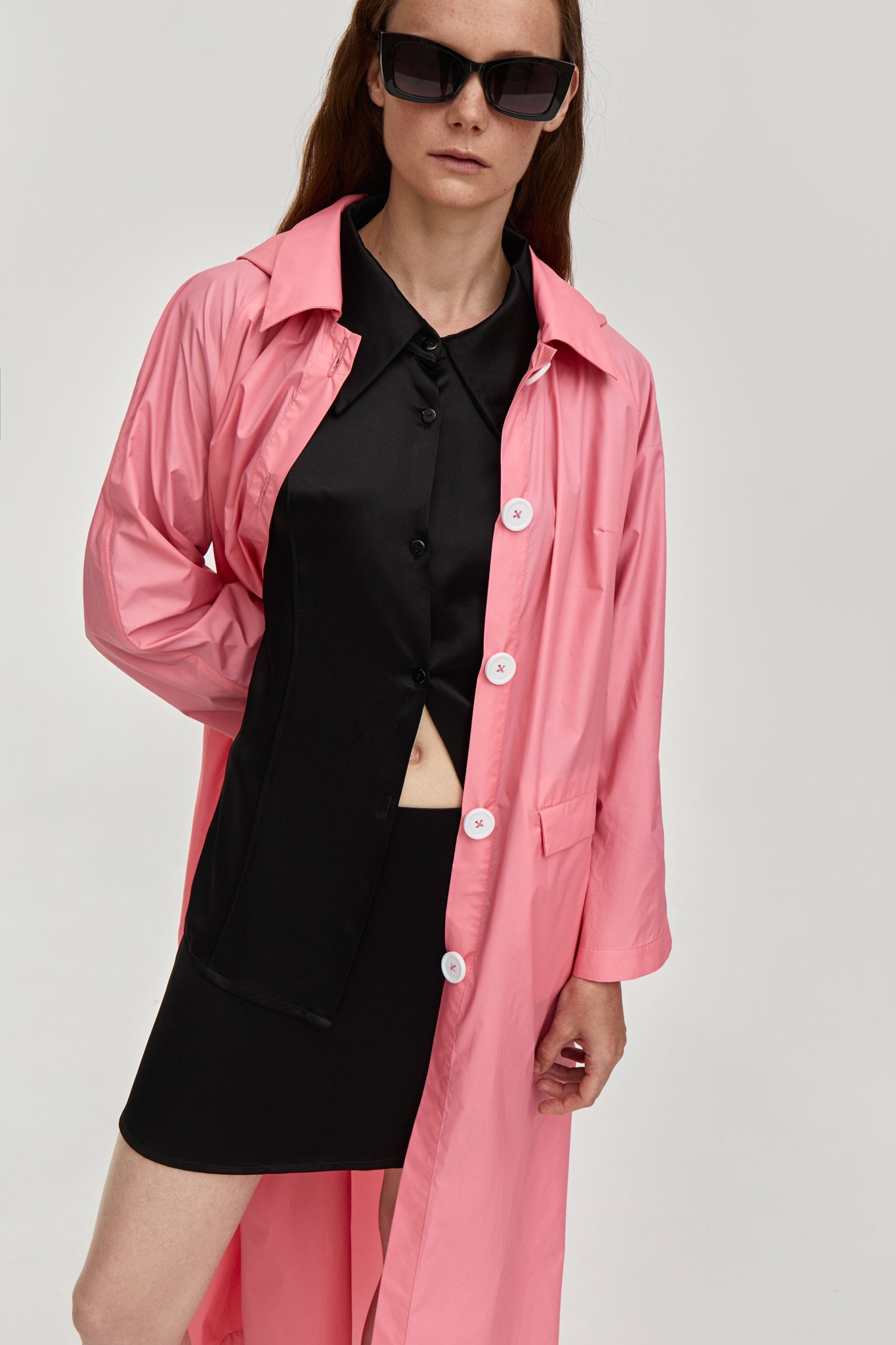 Summer raincoat with removable hood. Made from pink waterproof and breathable fabric. FORMA clothing