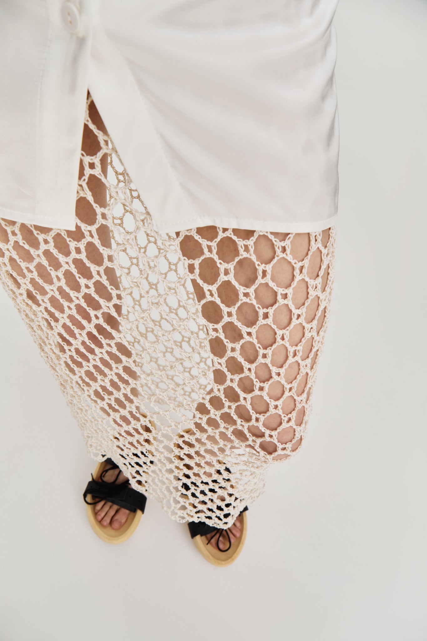 Crochet midi skirt in milky color from clothing brand FORMA